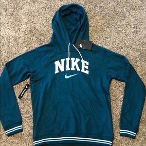 teal varsity style Nike hoodie
